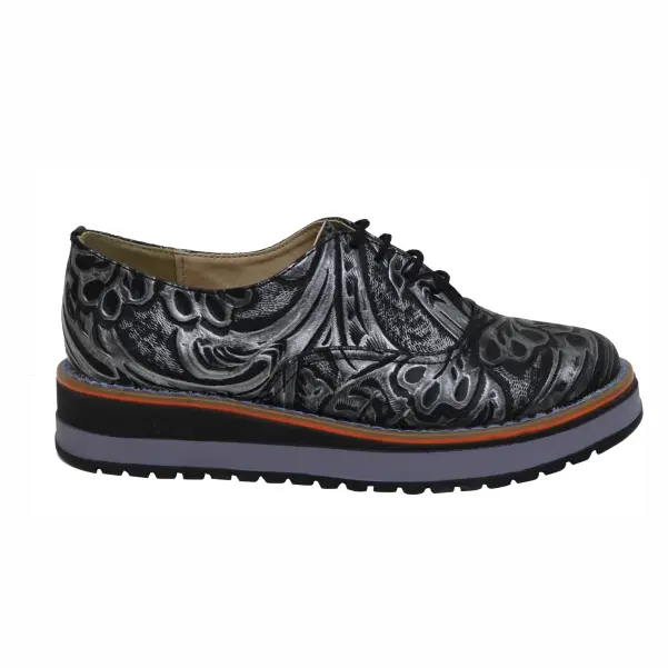 CALZADO CURPIEL MUÑEQUEADO