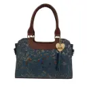 ANA PIEL FLORES MUÑEQUEADO SHEDRON/ORO