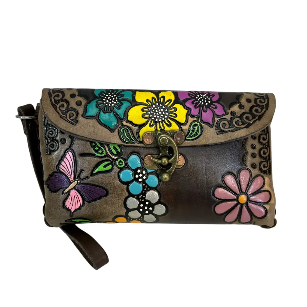 MUÑEQUERA VAQUETA CINCELADA 